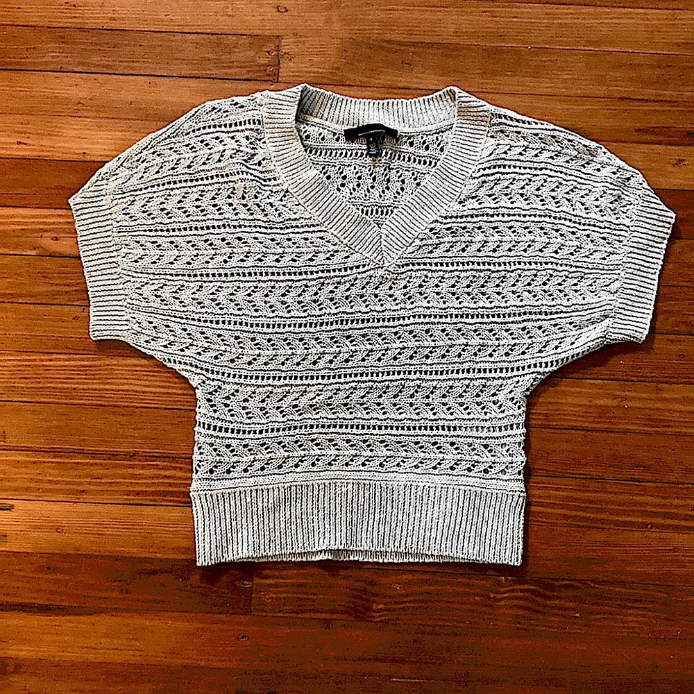 Unworn medium knitted woman’s top from white house black market